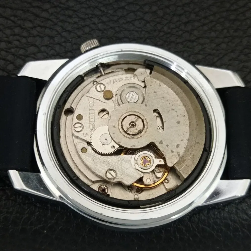 Vintage 1973 Seiko Automatic Mens Silver Watch W/daydate & White accents